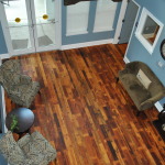 Repurposed roof decking from Strathmore Estates provides beautiful hardwood floors at Savannah Gardens Senior Residences